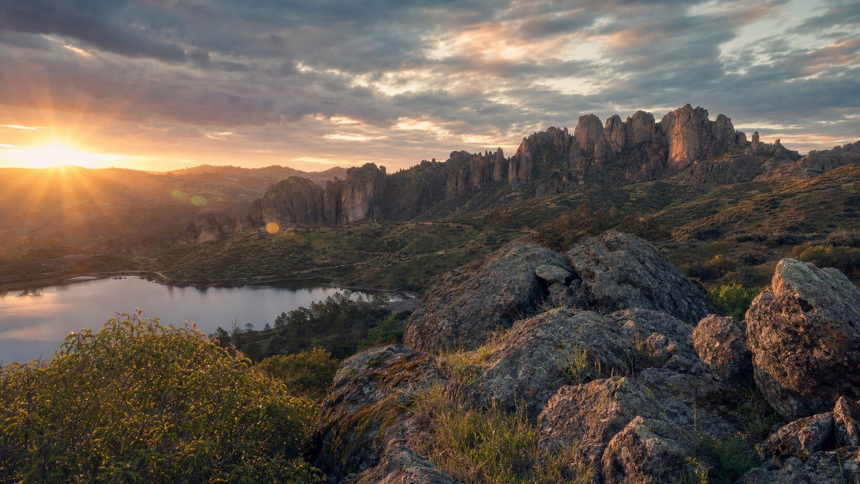 Sunrise landscape photograph at Pinnacles National Park from the most popular sunrise overlook, showing the signature foreground-to-background composition