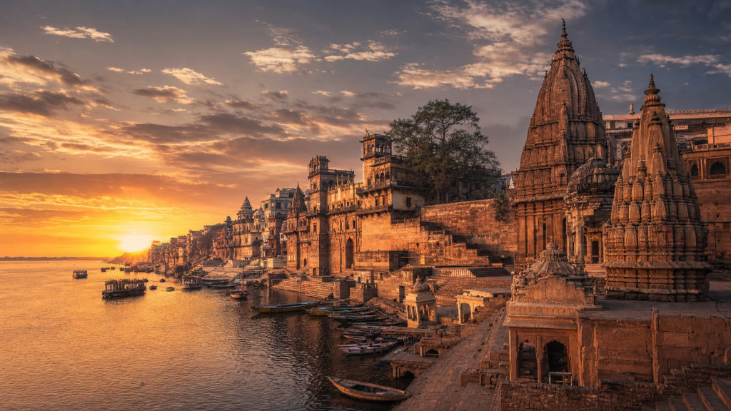 Varanasi skyline at golden hour with iconic landmarks in warm light