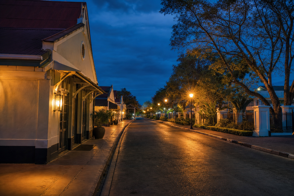 Street view in Victoria Falls, leading lines, architectural detail, blue hour with mixed ambient and street