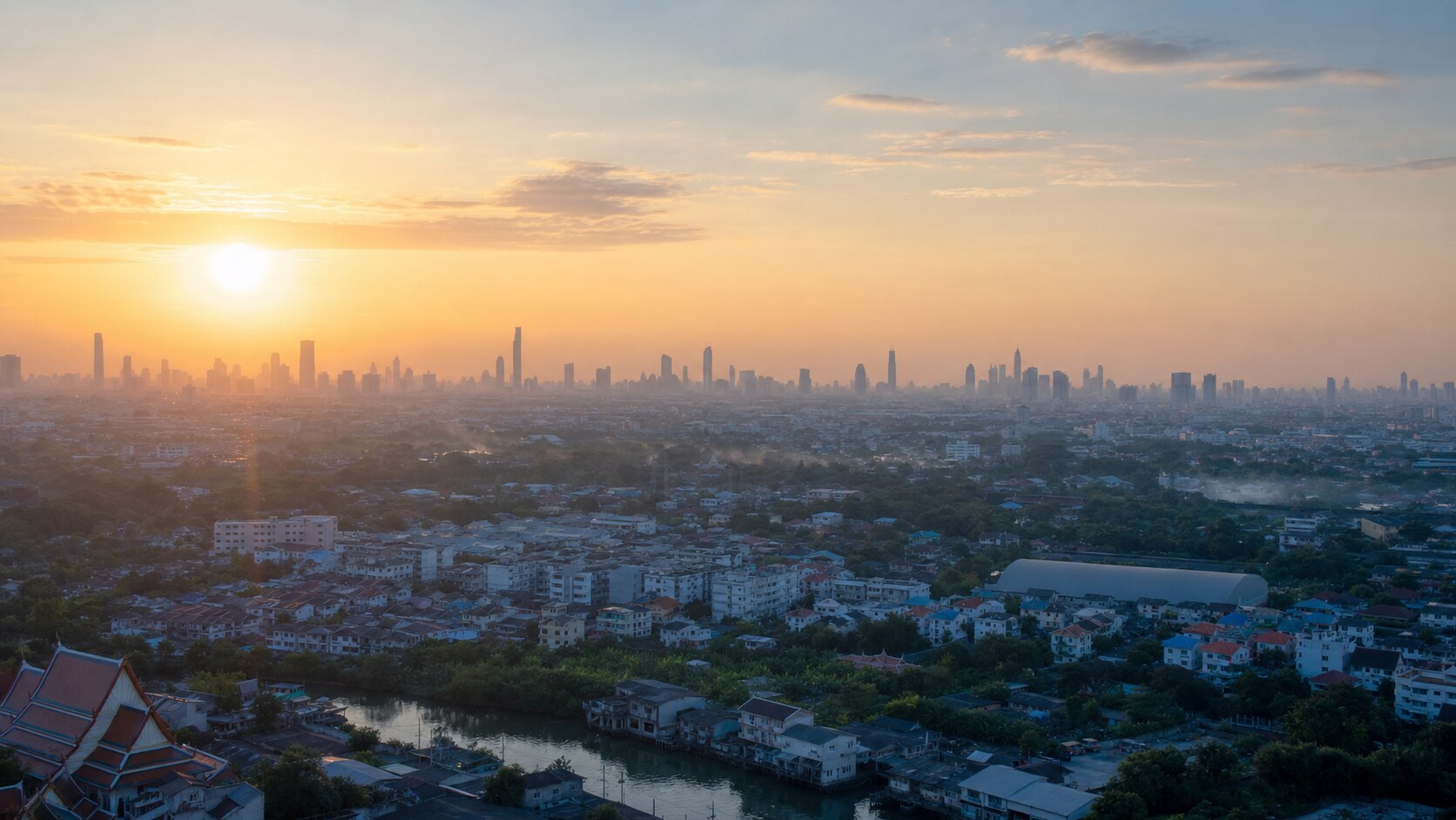 Sunrise aerial-style view of Bangkok, the signature opening shot most photography tours begin with
