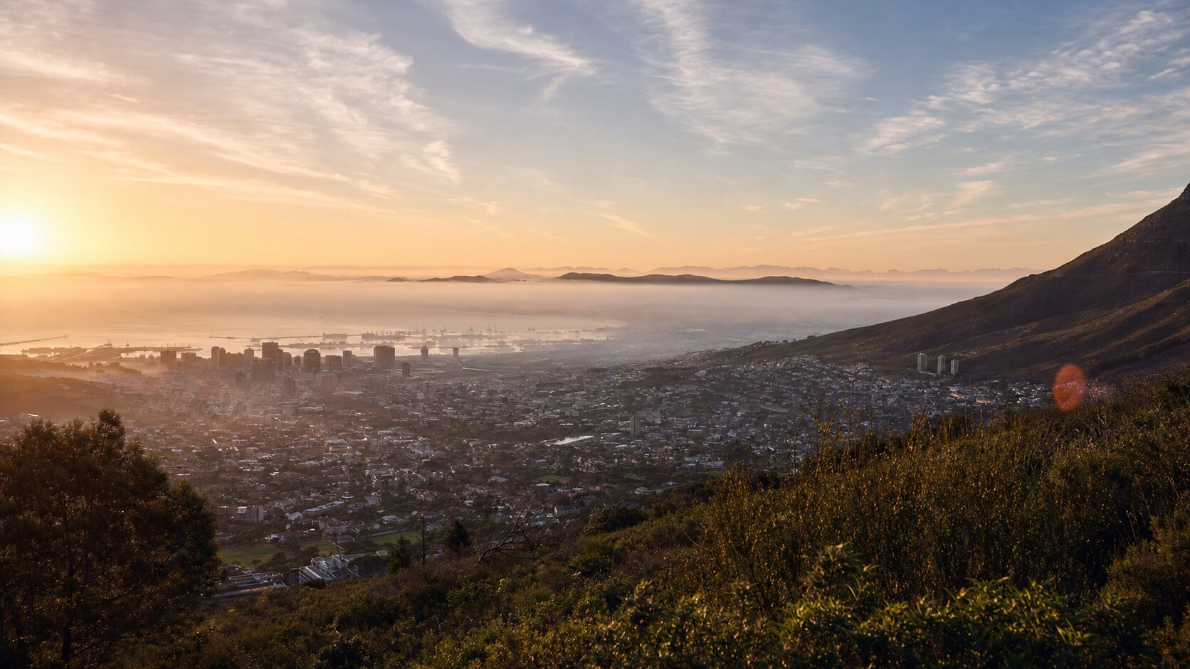 Sunrise aerial-style view of Cape Town, the signature opening shot most photography tours begin with