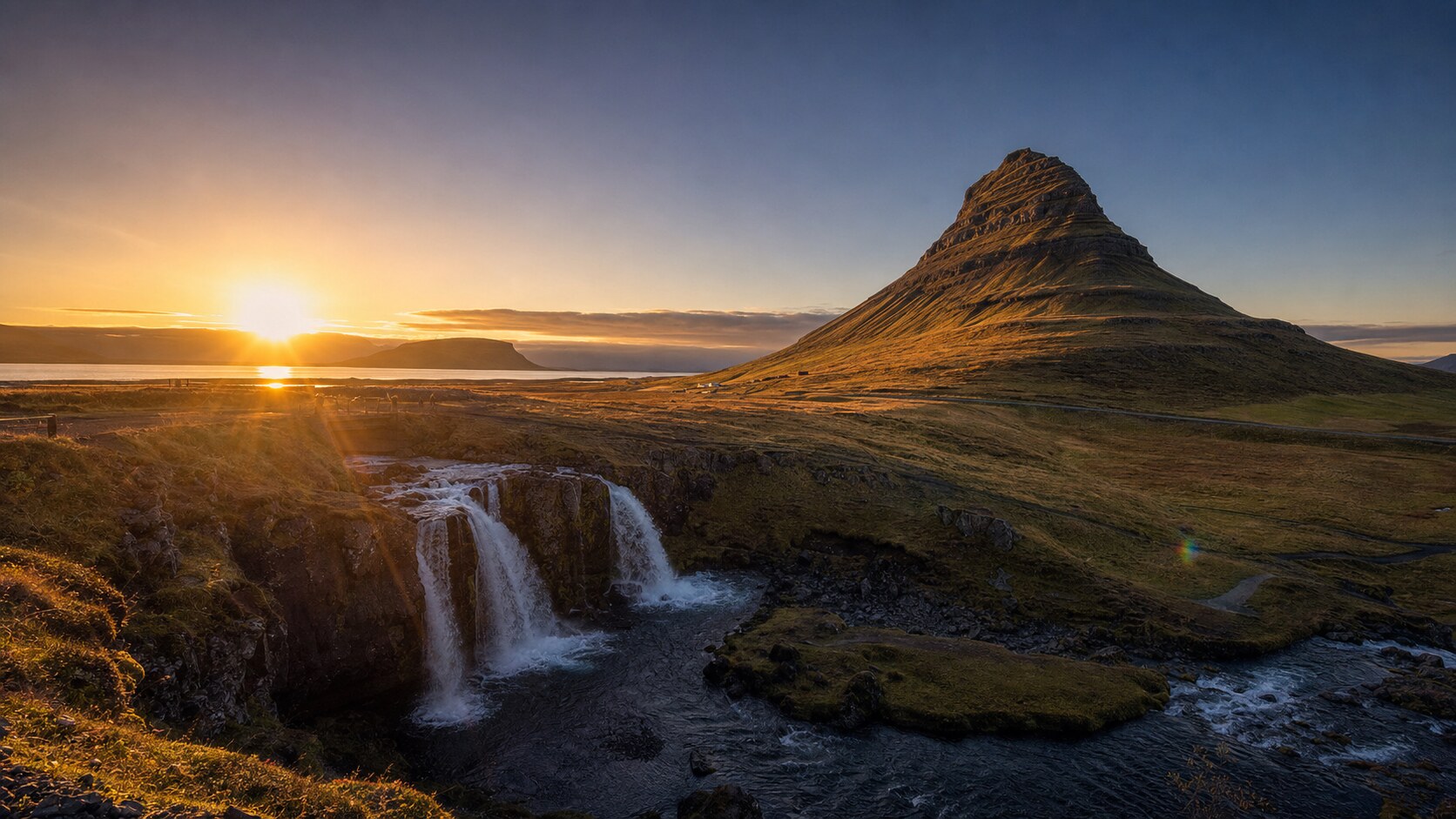 Iceland photography tour at golden hour — wide landscape view from the main scenic vantage point used by photographer-led tours