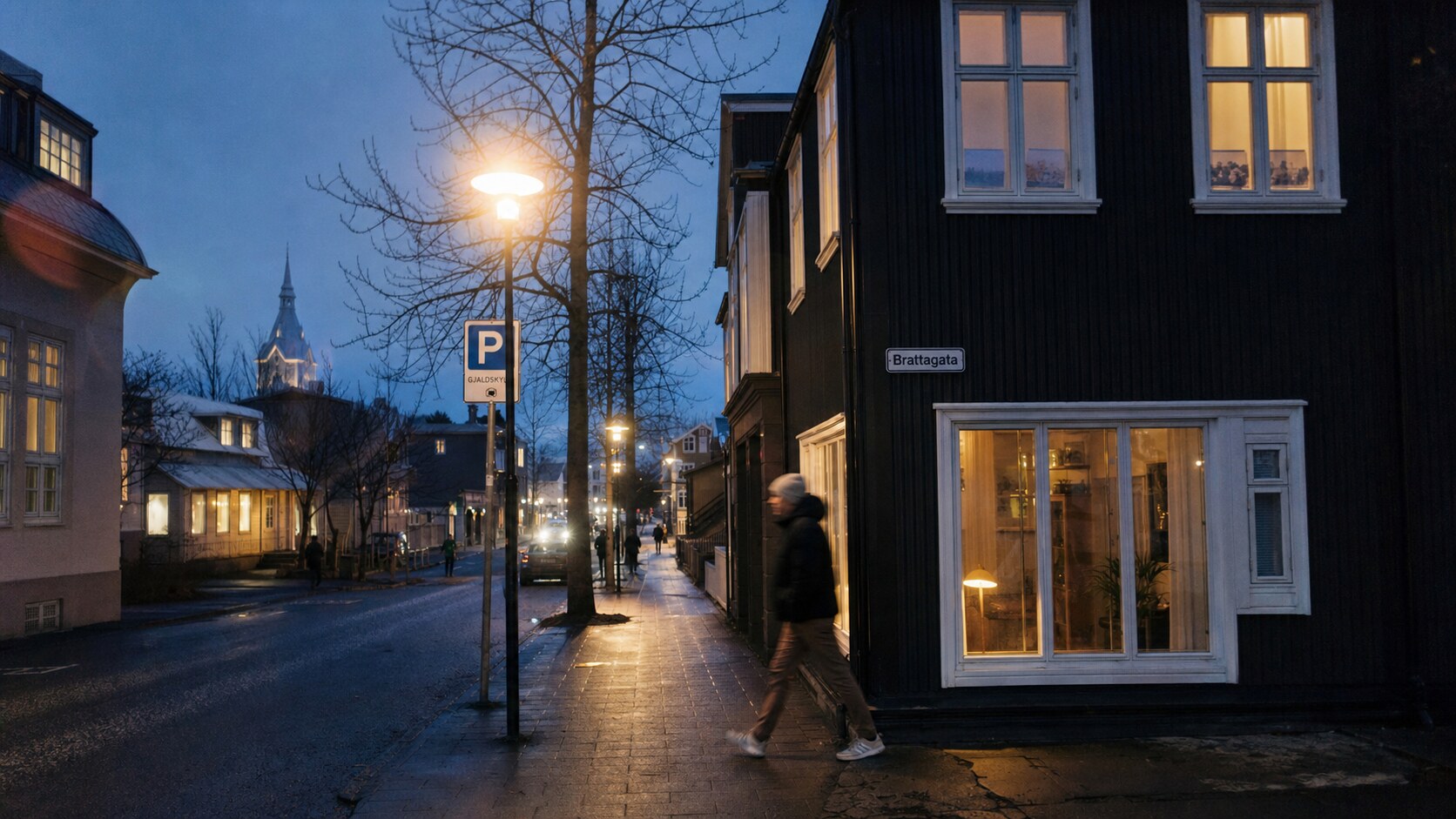 Blue hour street photography scene in Iceland during a guided photography tour, showing the kind of low-light composition tour photographers cover