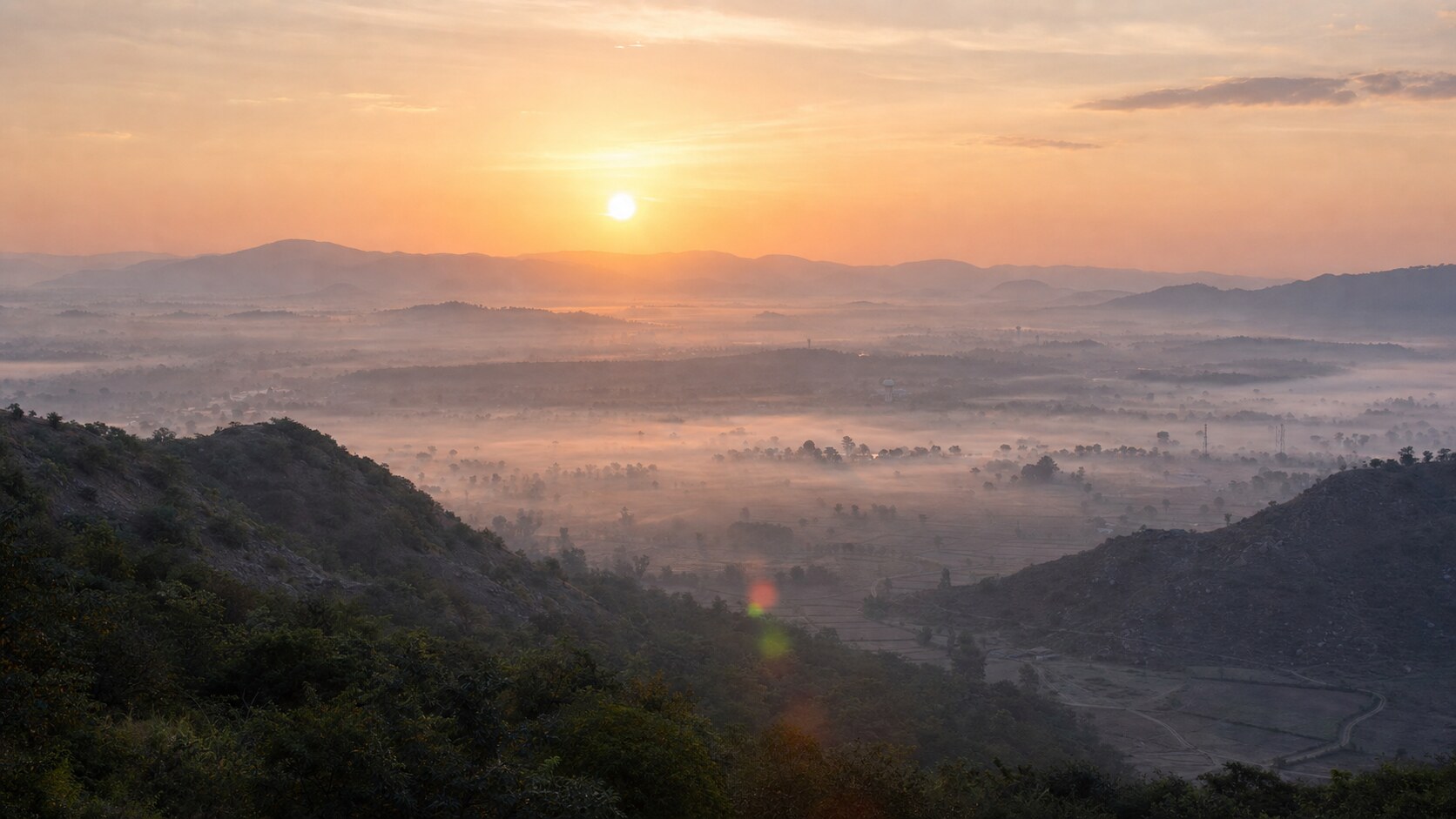 Sunrise aerial-style view of India, the signature opening shot most photography tours begin with
