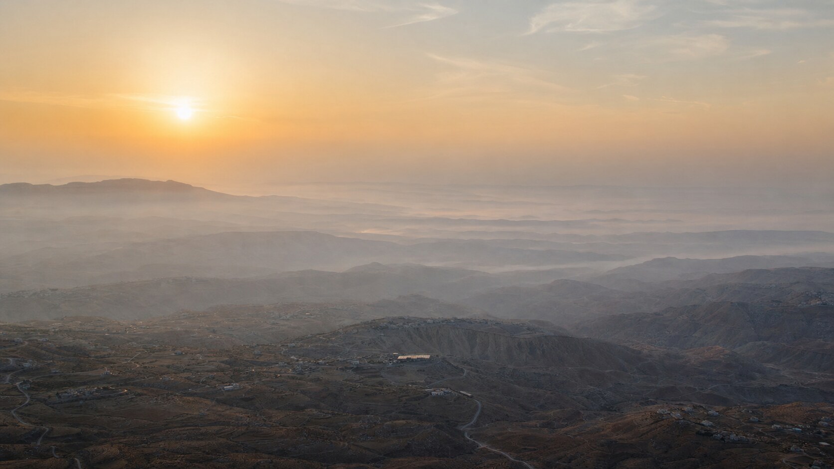 Sunrise aerial-style view of Jordan, the signature opening shot most photography tours begin with