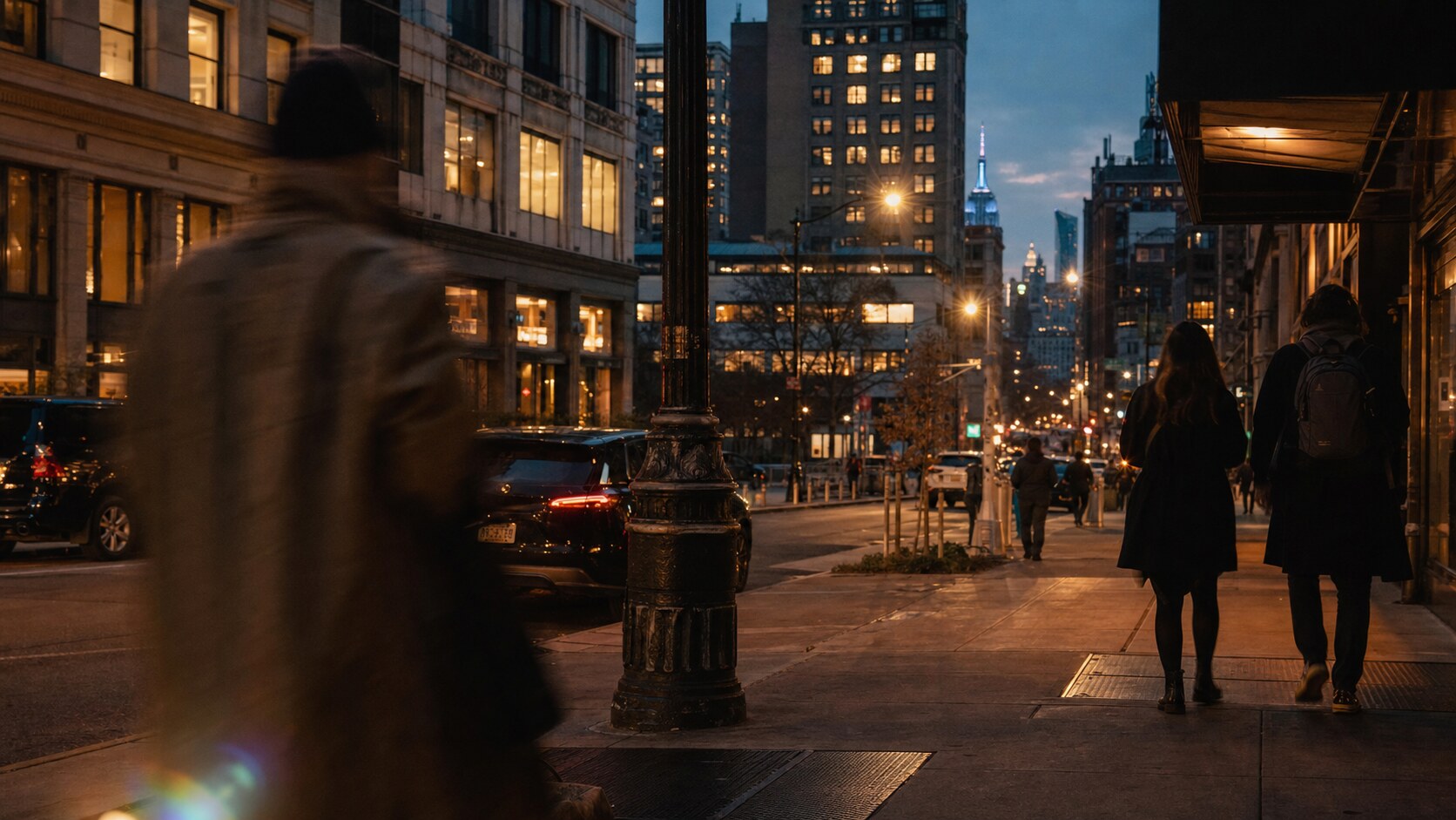 Blue hour street photography scene in New York City during a guided photography tour, showing the kind of low-light composition tour photographers cover