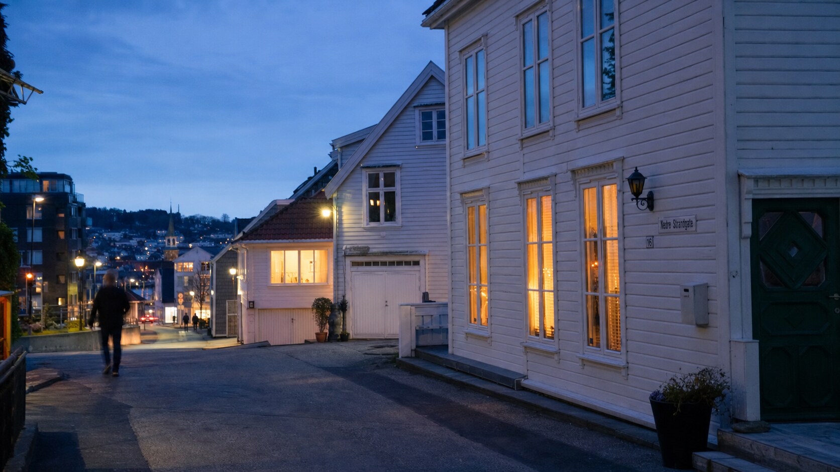 Blue hour street photography scene in Norway during a guided photography tour, showing the kind of low-light composition tour photographers cover