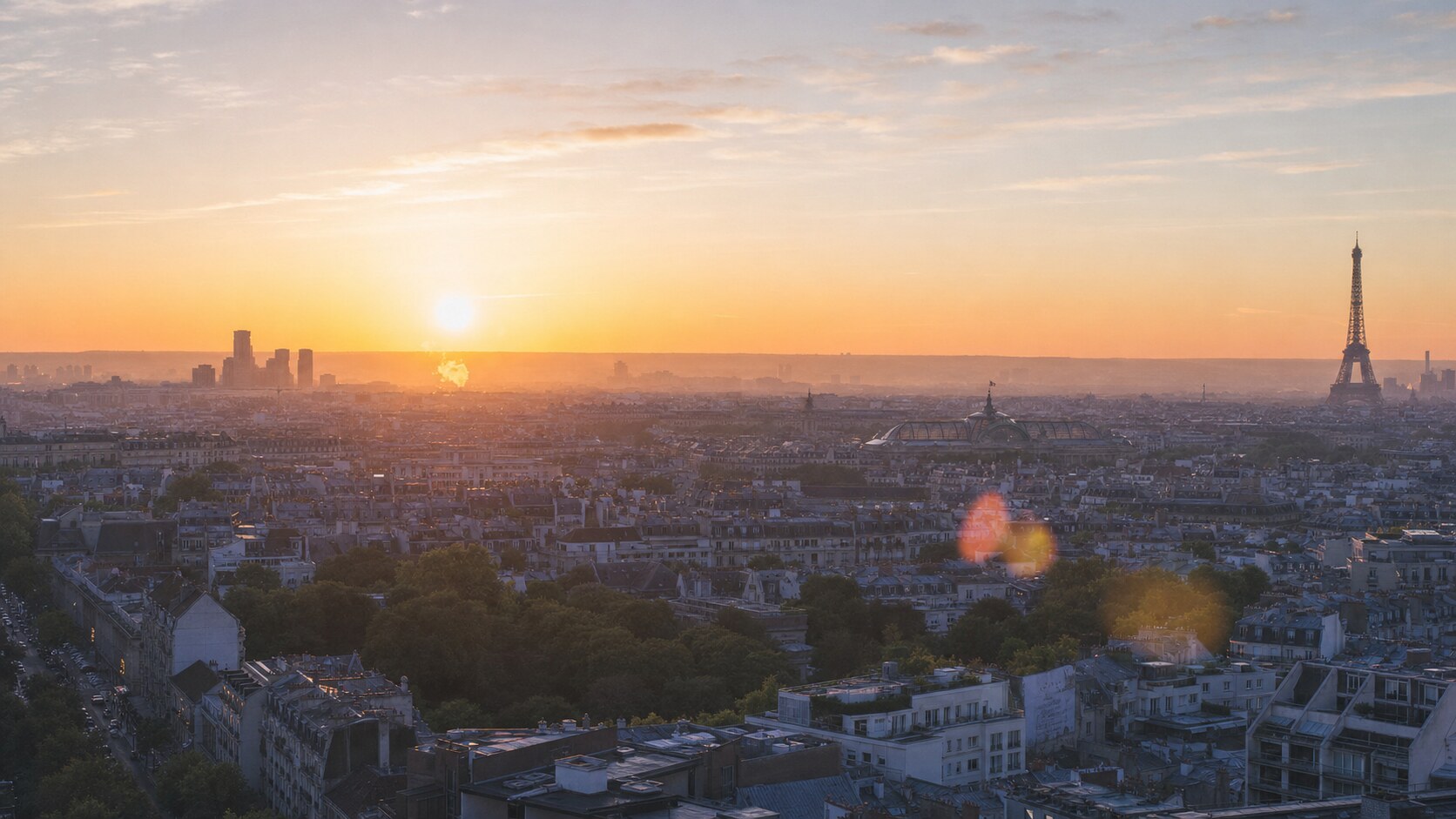 Sunrise aerial-style view of Paris, the signature opening shot most photography tours begin with