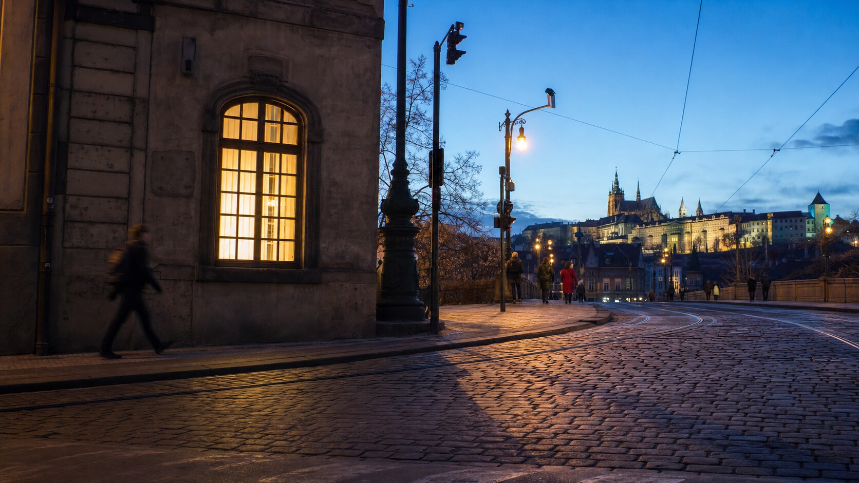 Blue hour street photography scene in Prague during a guided photography tour, showing the kind of low-light composition tour photographers cover