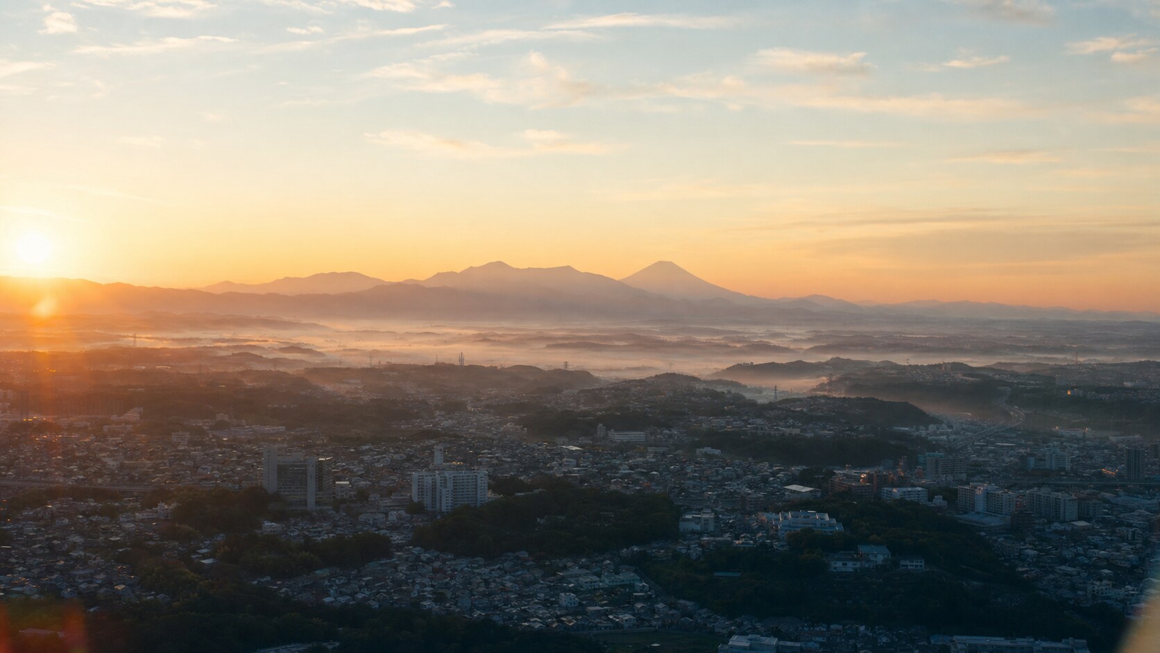 Sunrise aerial-style view of Tokyo, the signature opening shot most photography tours begin with