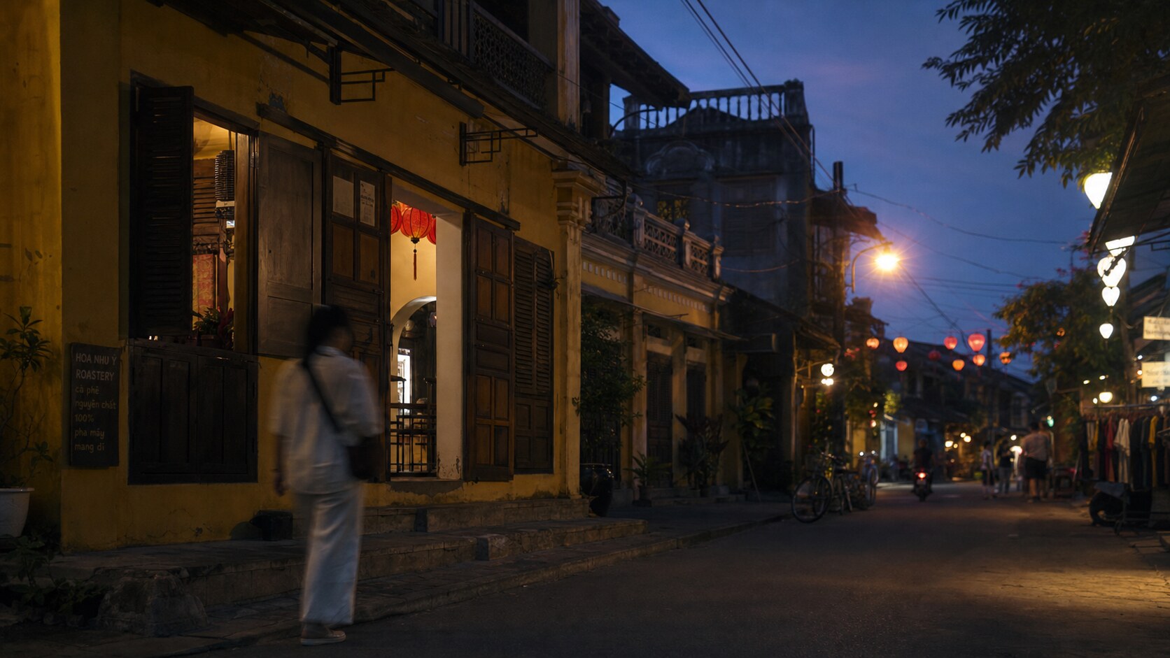 Blue hour street photography scene in Vietnam during a guided photography tour, showing the kind of low-light composition tour photographers cover