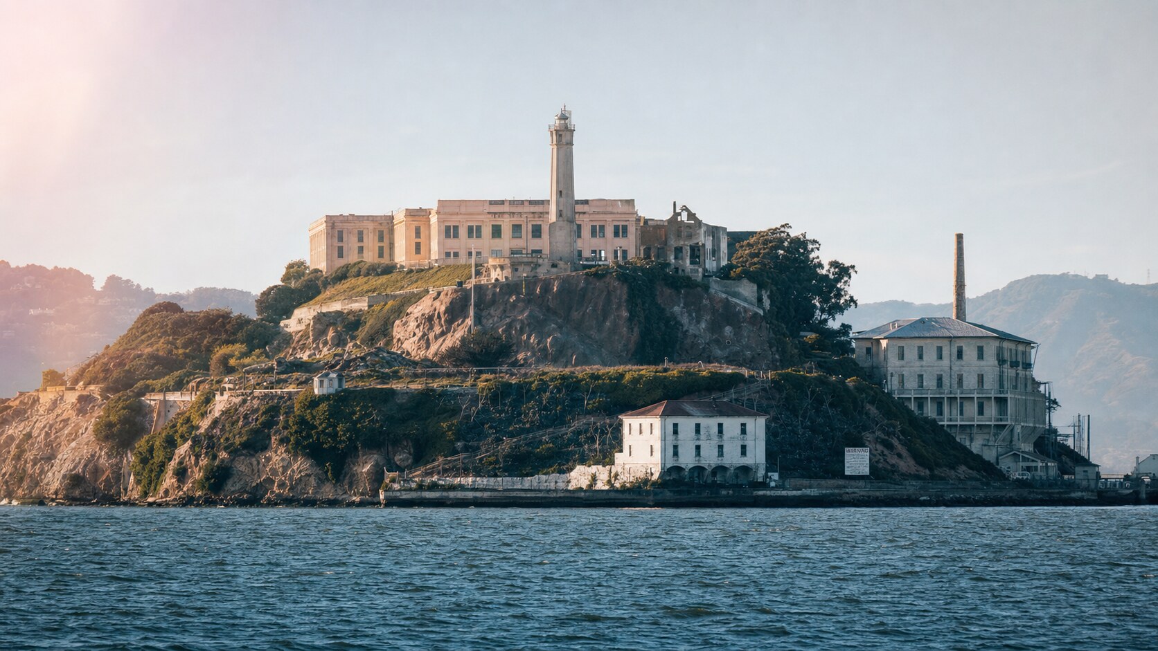 Close-up architectural detail of Alcatraz Island at late afternoon, showing surface texture and material under directional sun