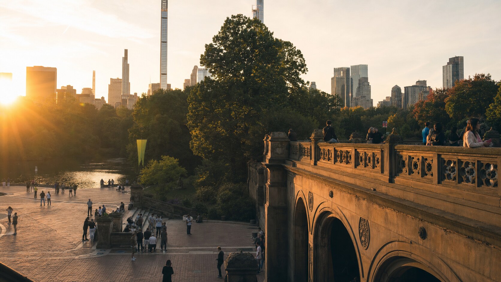 Central Park photographed at golden hour from the most popular hero-shot vantage point, with dramatic side-lighting on the structure