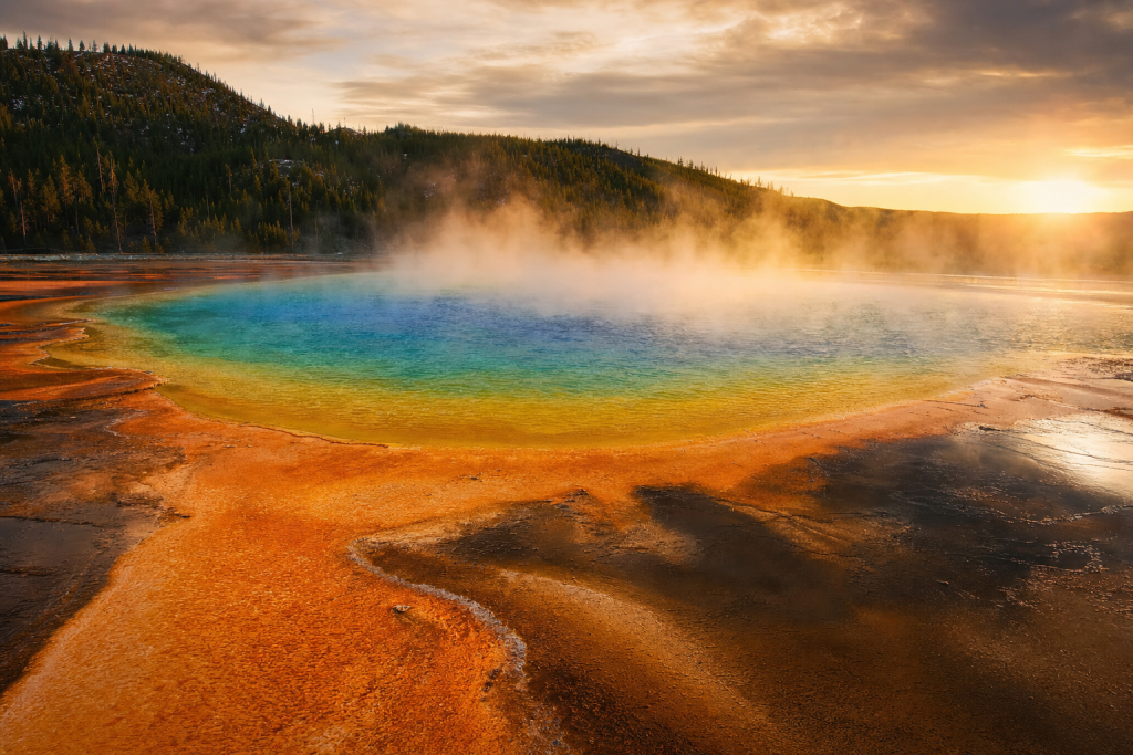 Detail-rich photograph related to How to Photograph Grand Prismatic Spring, late golden hour light, photorealistic, no text