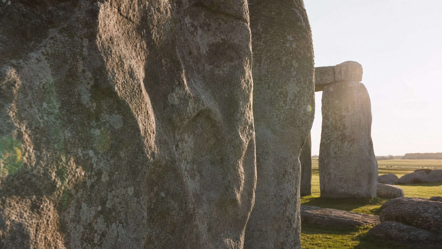 Close-up architectural detail of Stonehenge at late afternoon, showing surface texture and material under directional sun