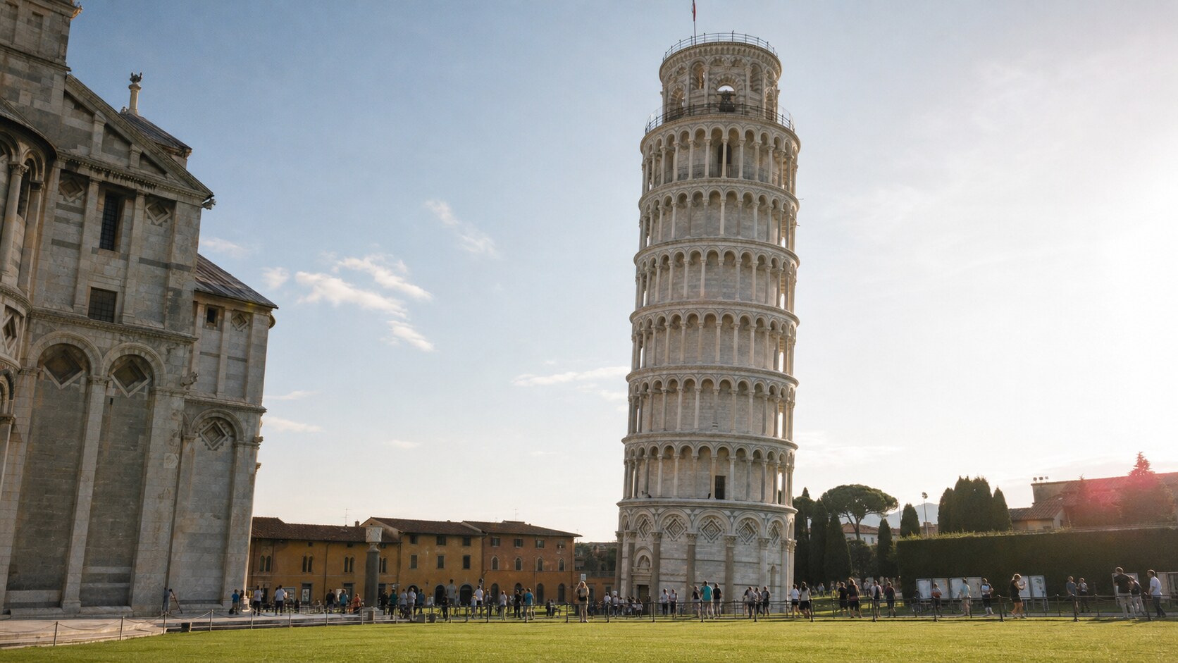 Close-up architectural detail of The Leaning Tower Of Pisa at late afternoon, showing surface texture and material under directional sun