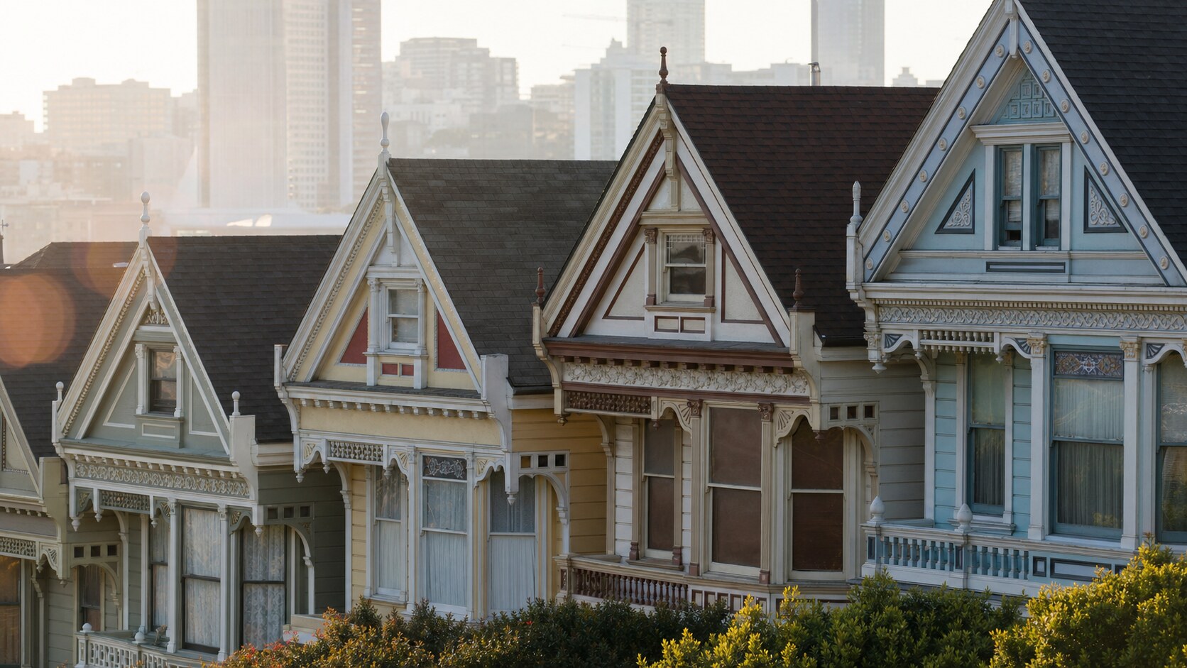 Close-up architectural detail of The Painted Ladies at late afternoon, showing surface texture and material under directional sun