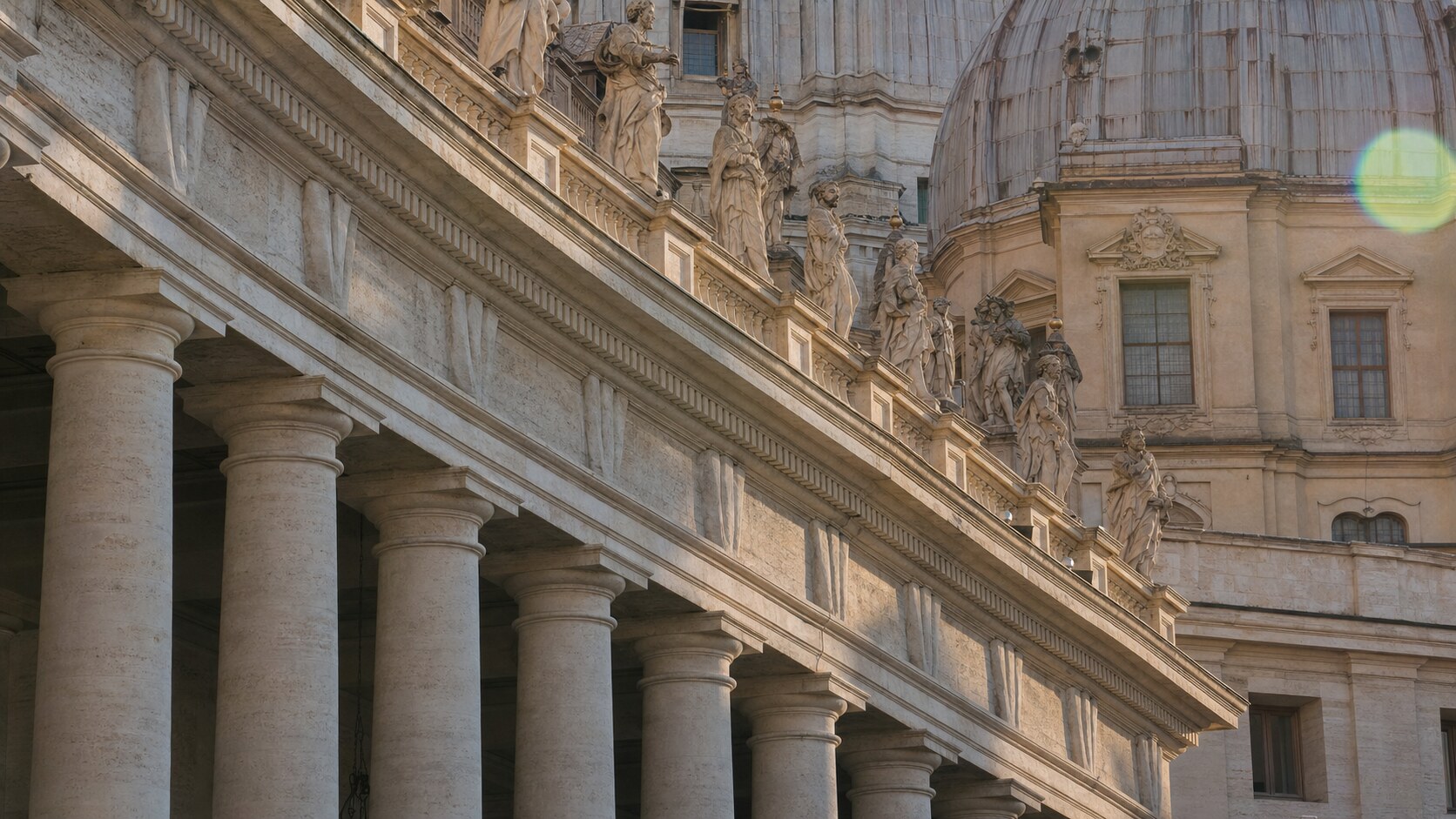 Close-up architectural detail of The Vatican at late afternoon, showing surface texture and material under directional sun