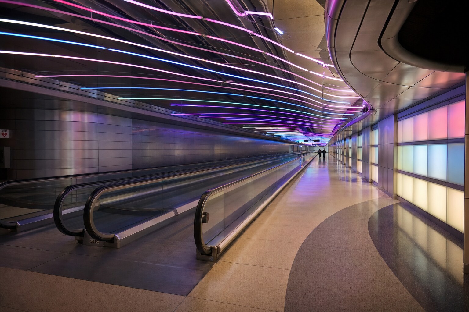 Sky's the Limit neon tunnel between Concourse B and C at O'Hare Terminal 1