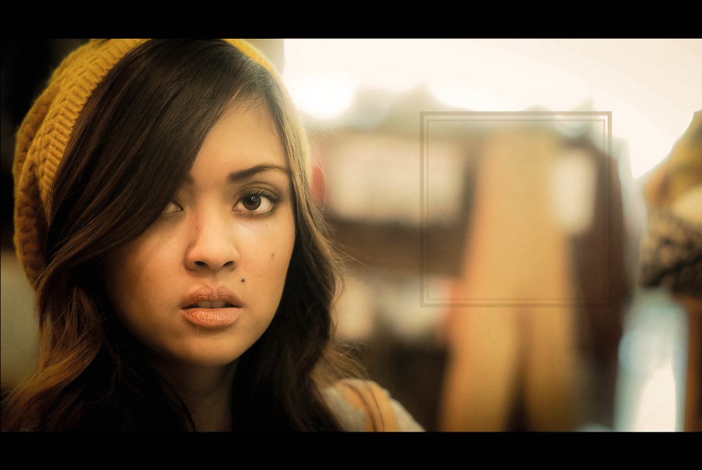 Professional fashion portrait at dusk using the rule of thirds and dynamic posing techniques.