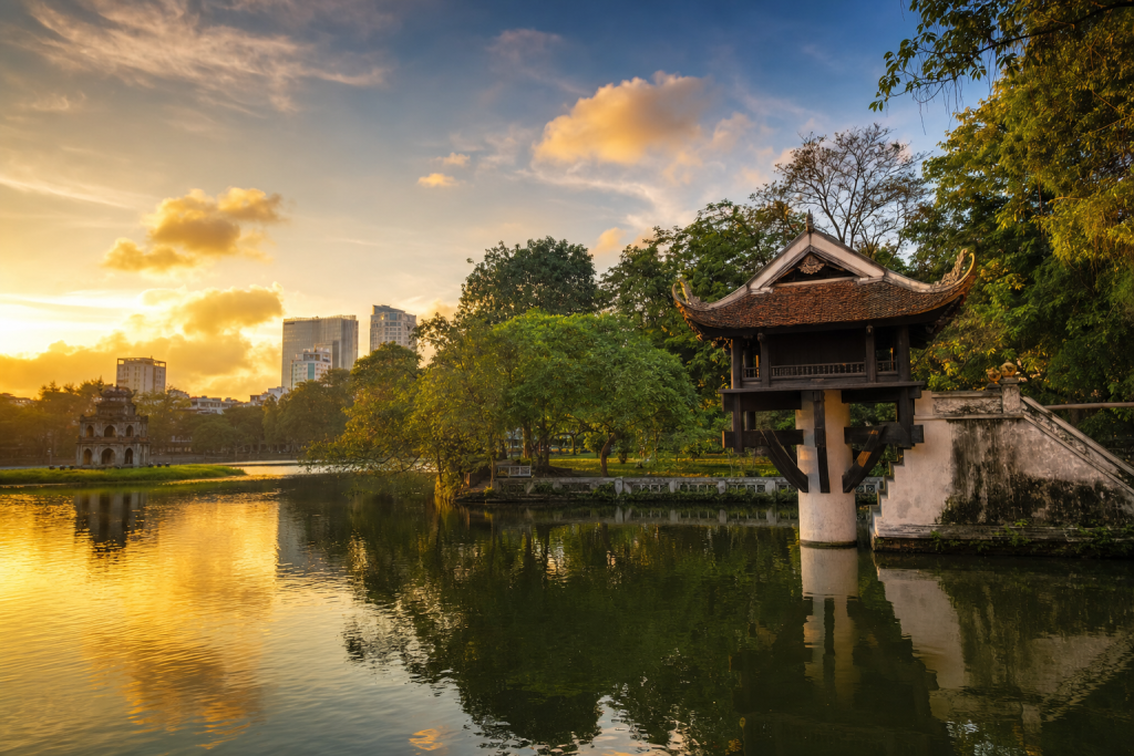 Pt Best Photography Spots in Hanoi at golden hour, iconic landmarks visible, dramatic warm