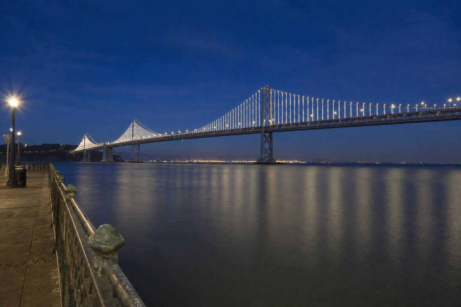 Bay Bridge west span with Bay Lights LEDs at blue hour from Pier 14 Embarcadero