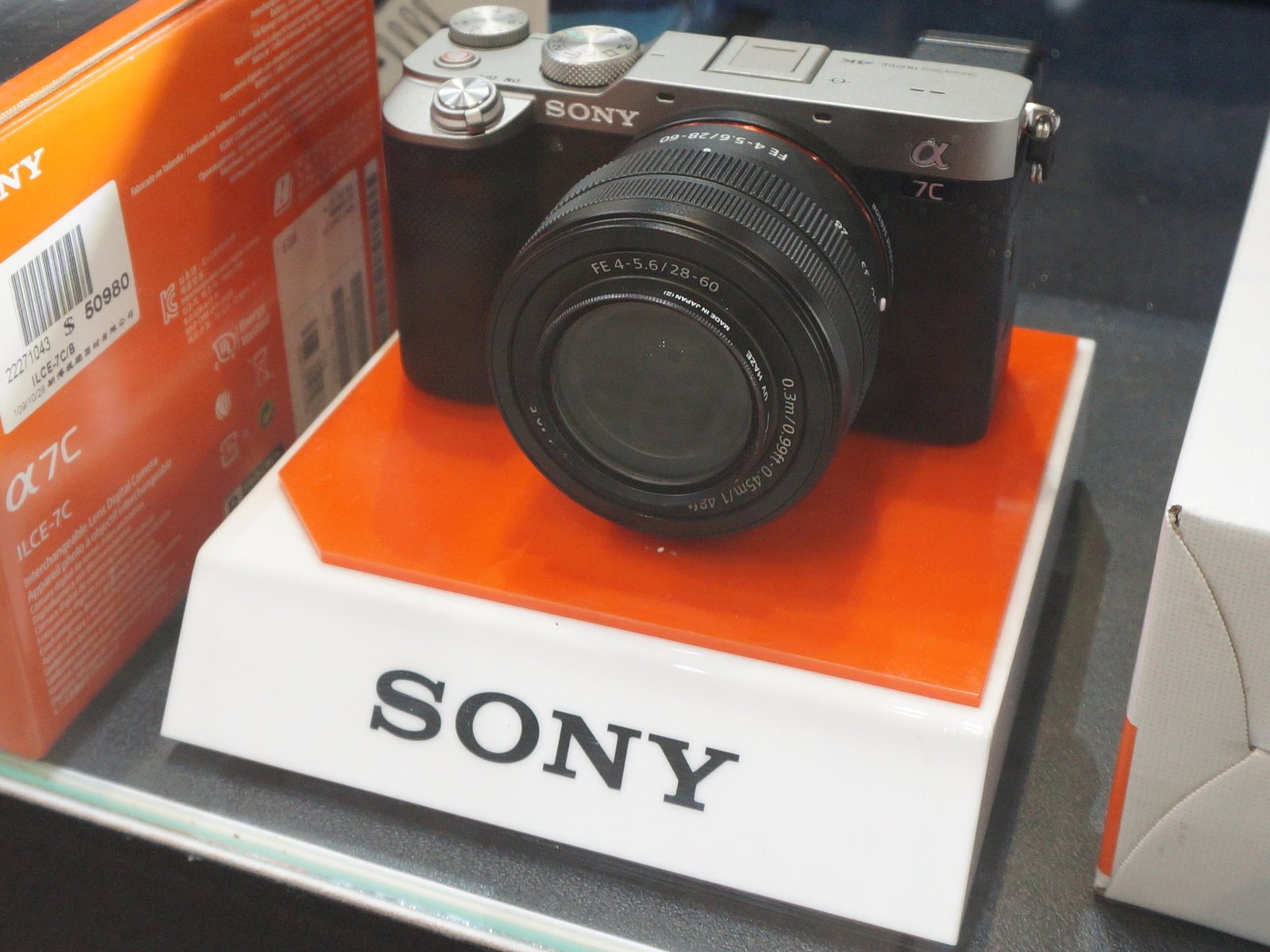 Sony A7C compact full-frame mirrorless camera body with grip and controls visible, ideal lightweight travel camera form factor