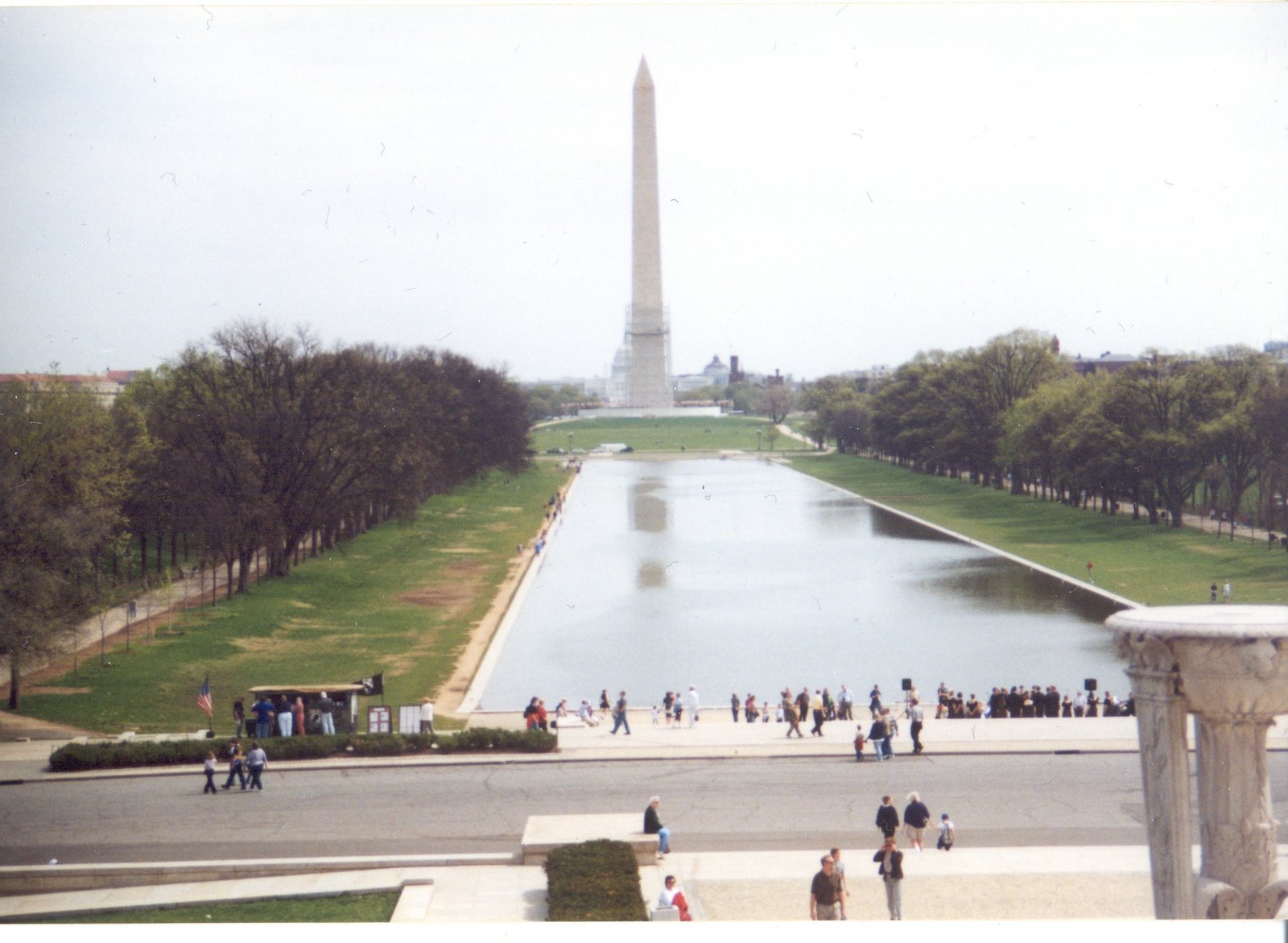 Washington Monument mirrored in the still surface of the Lincoln Memorial Reflecting Pool, National Mall, Washington DC