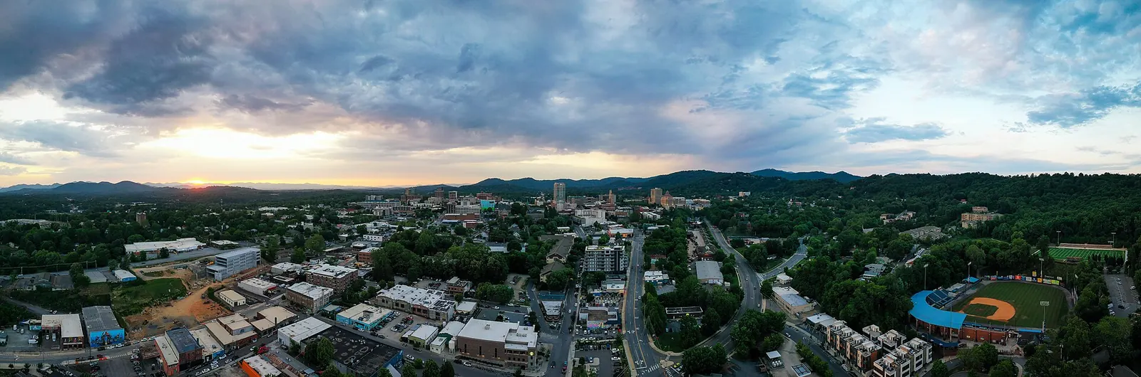 Aerial sunset panorama of downtown Asheville in North Carolina demonstrating a travel photography composition.
