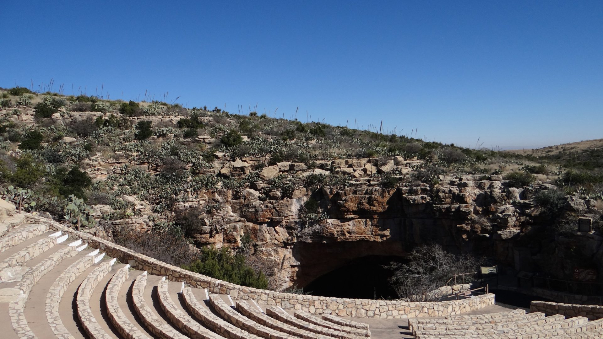 Empty stone amphitheater beside the Natural Entrance at Carlsbad Caverns