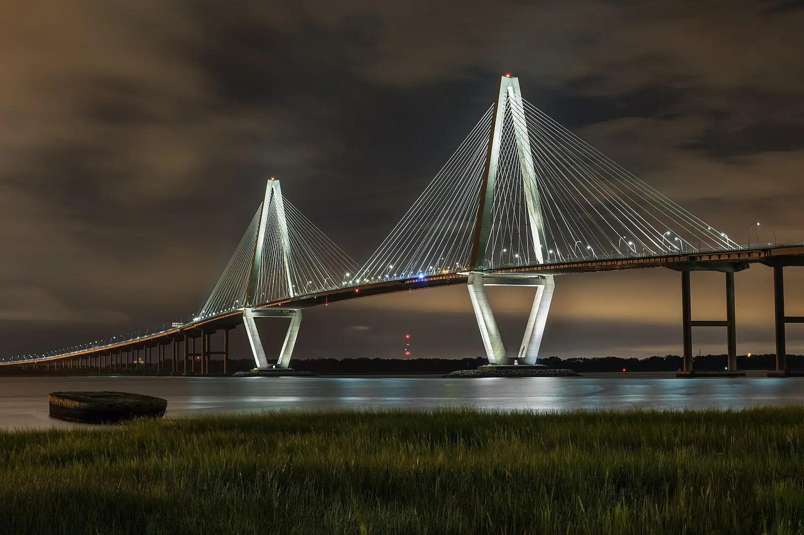 Blue-hour long exposure of the Arthur Ravenel Jr. Bridge in Charleston, South Carolina demonstrating a travel photography composition.