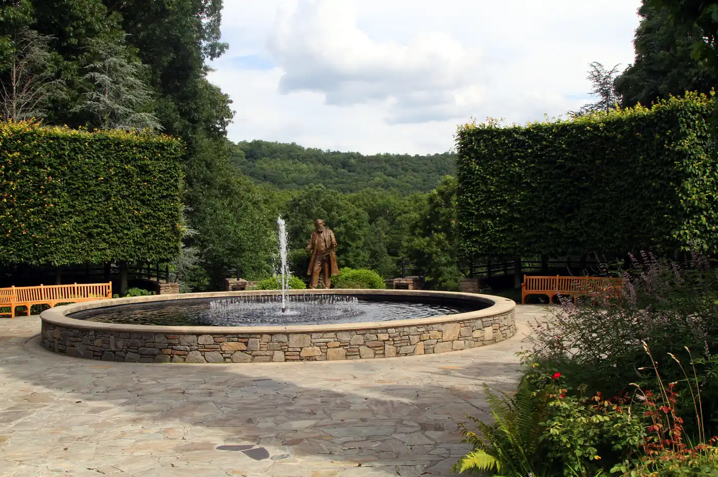 Fountain and gardens at the North Carolina Arboretum in Asheville demonstrating a travel photography composition.