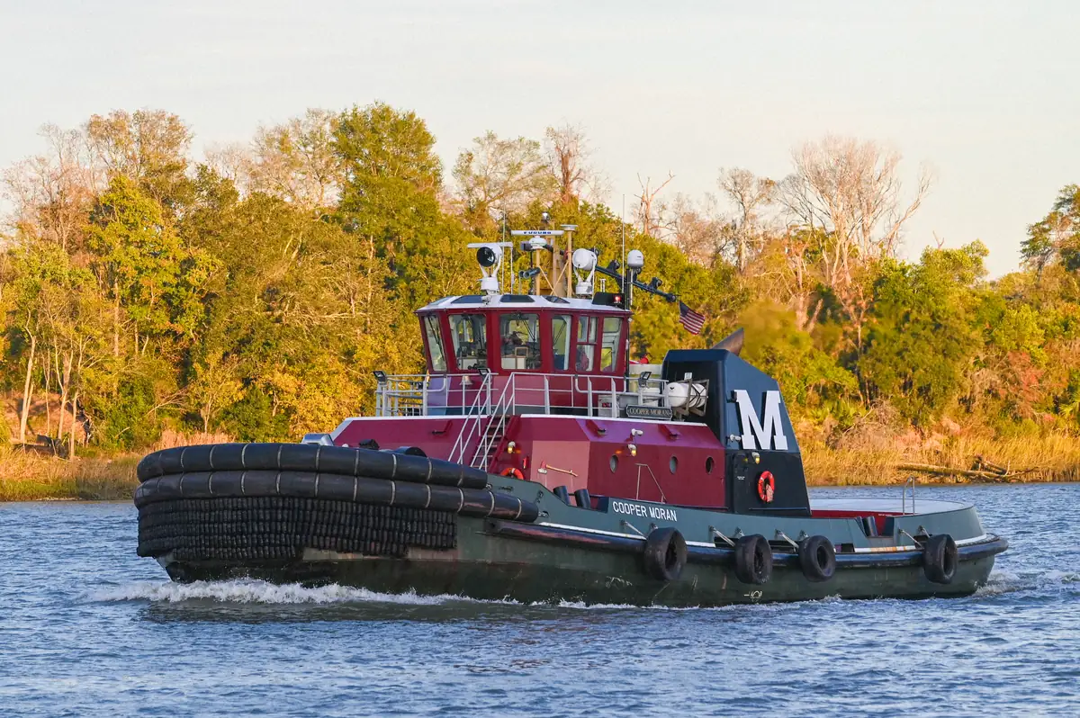 Tugboat on the Savannah River at River Street in Savannah, Georgia demonstrating a travel photography composition.