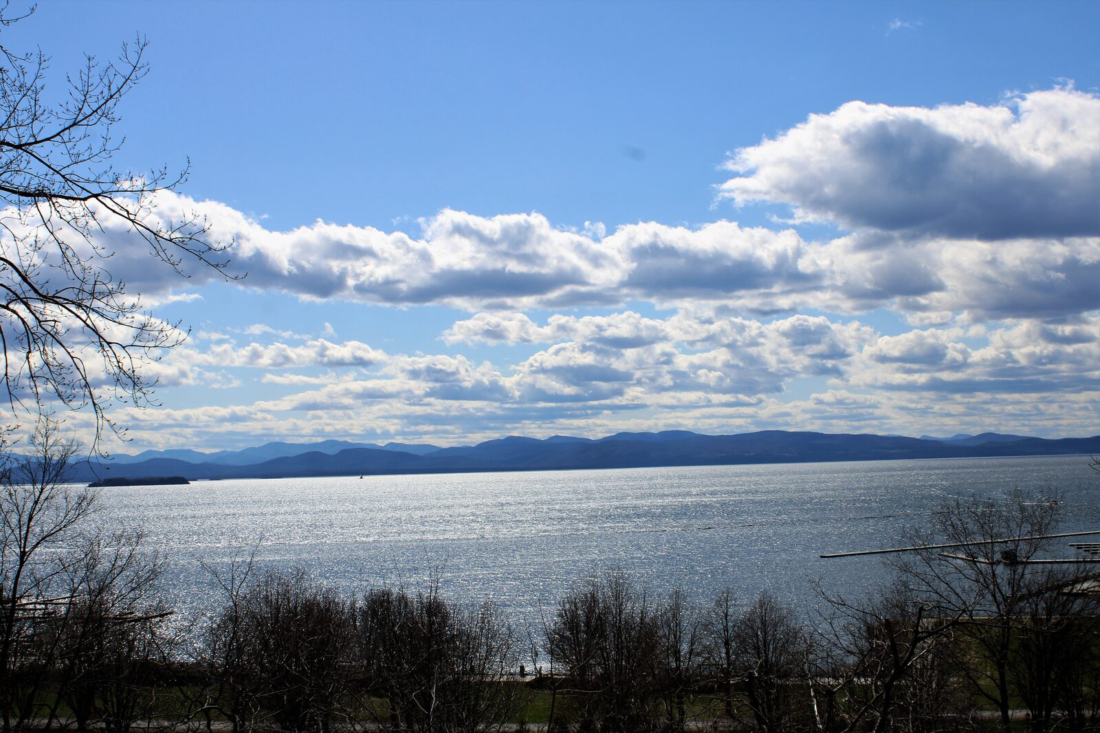 Lake Champlain from Burlington Vermont with Adirondack ridge demonstrating a travel photography composition.