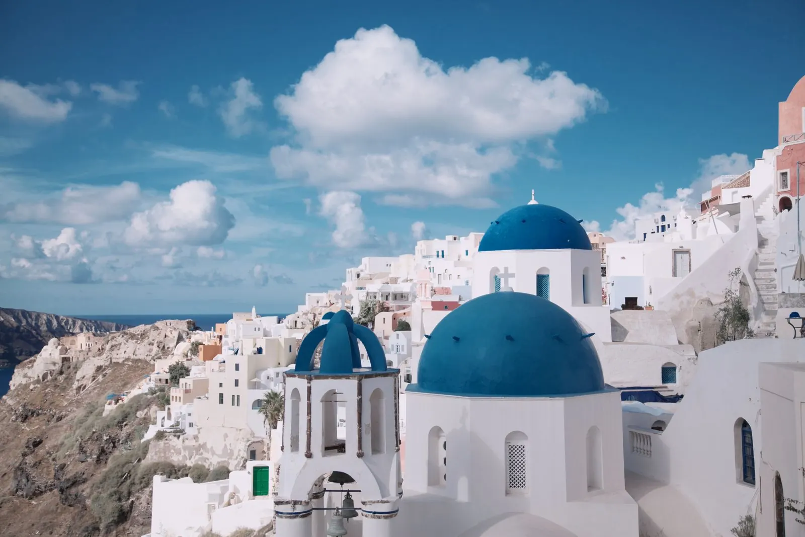 Santorini blue domes cityscape demonstrating standard zoom lens performance for a Sony 24-70mm GM II review tutorial.