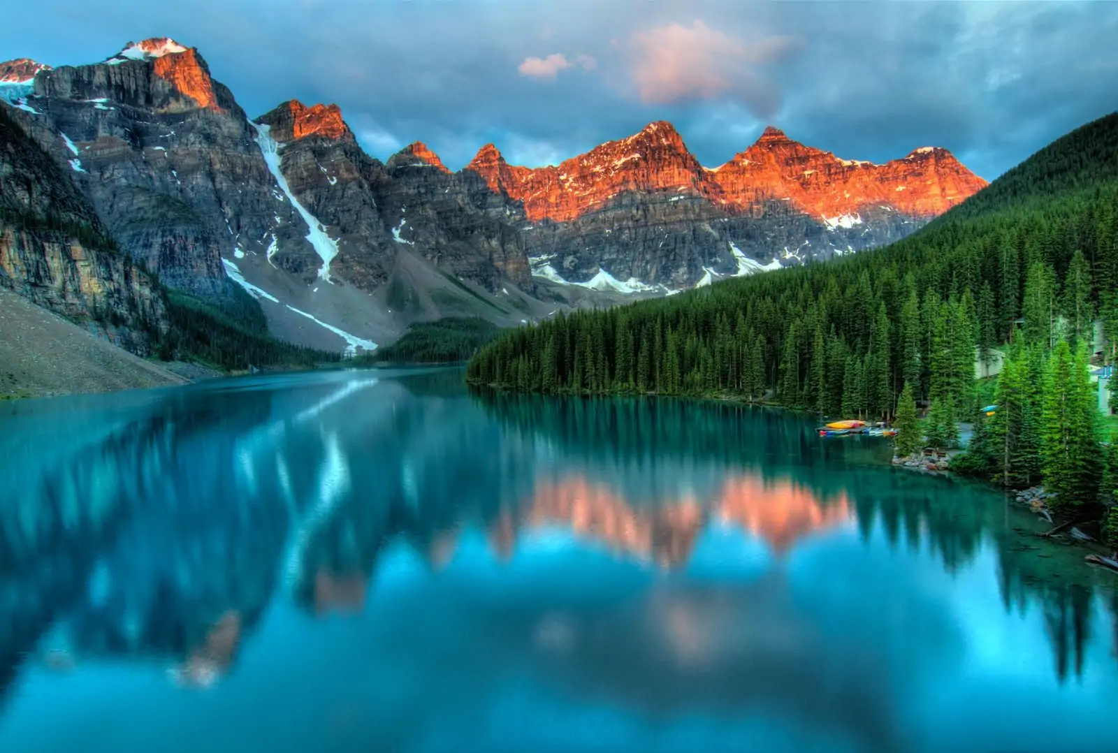 Mountain lake reflection at golden hour demonstrating a travel photography composition