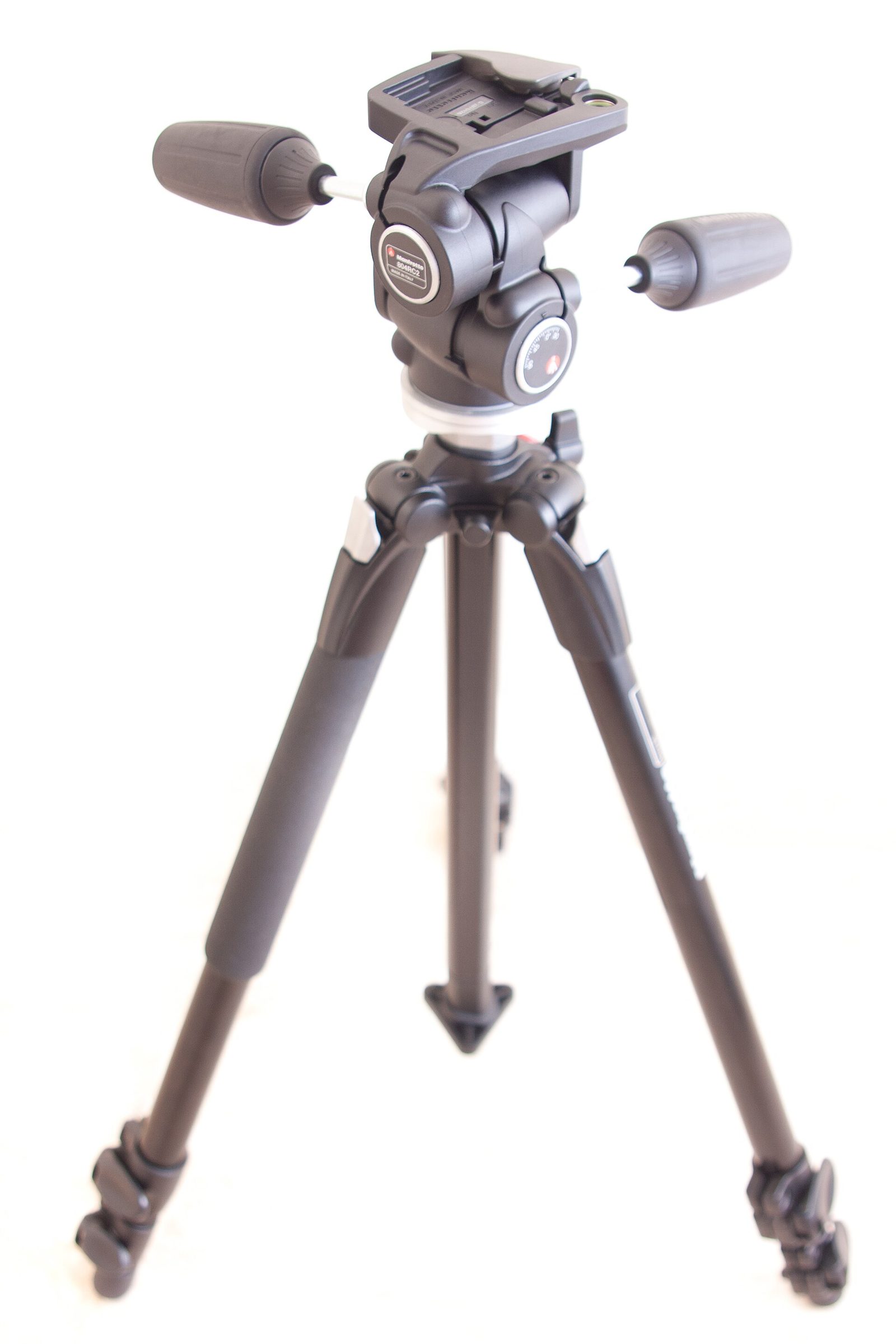 Heavy-duty tripod with camera mounted demonstrating long-lens support for a heavy-duty tripod buyer guide tutorial.