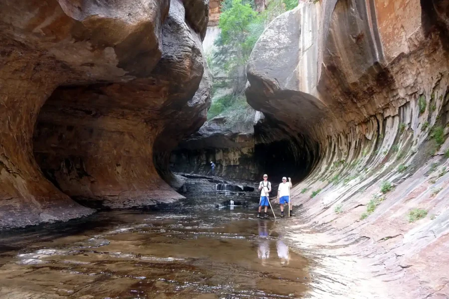 Long exposure of The Subway slot canyon in Zion National Park, Utah demonstrating a travel photography composition.