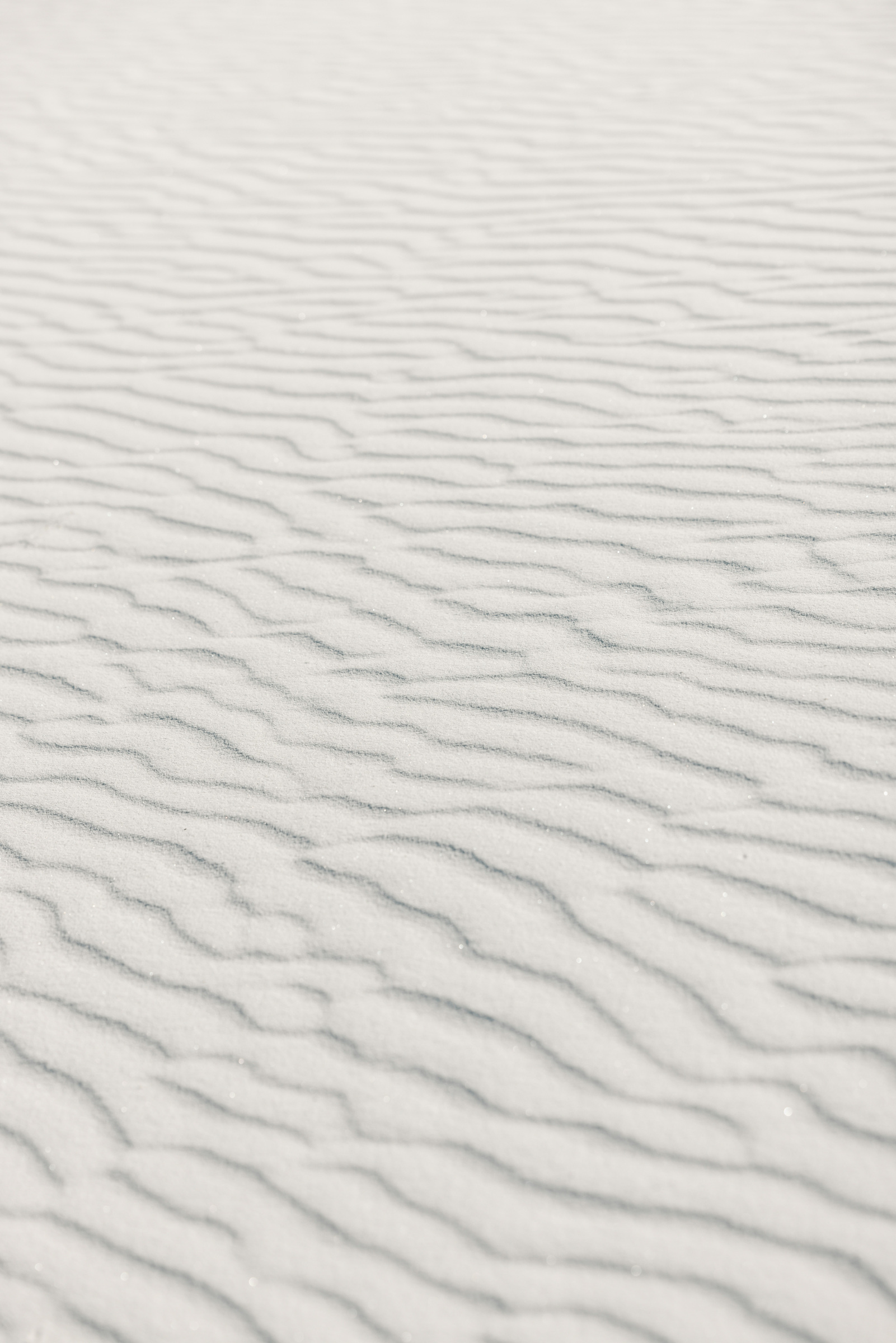 Close view of pale sand ripples at White Sands National Park