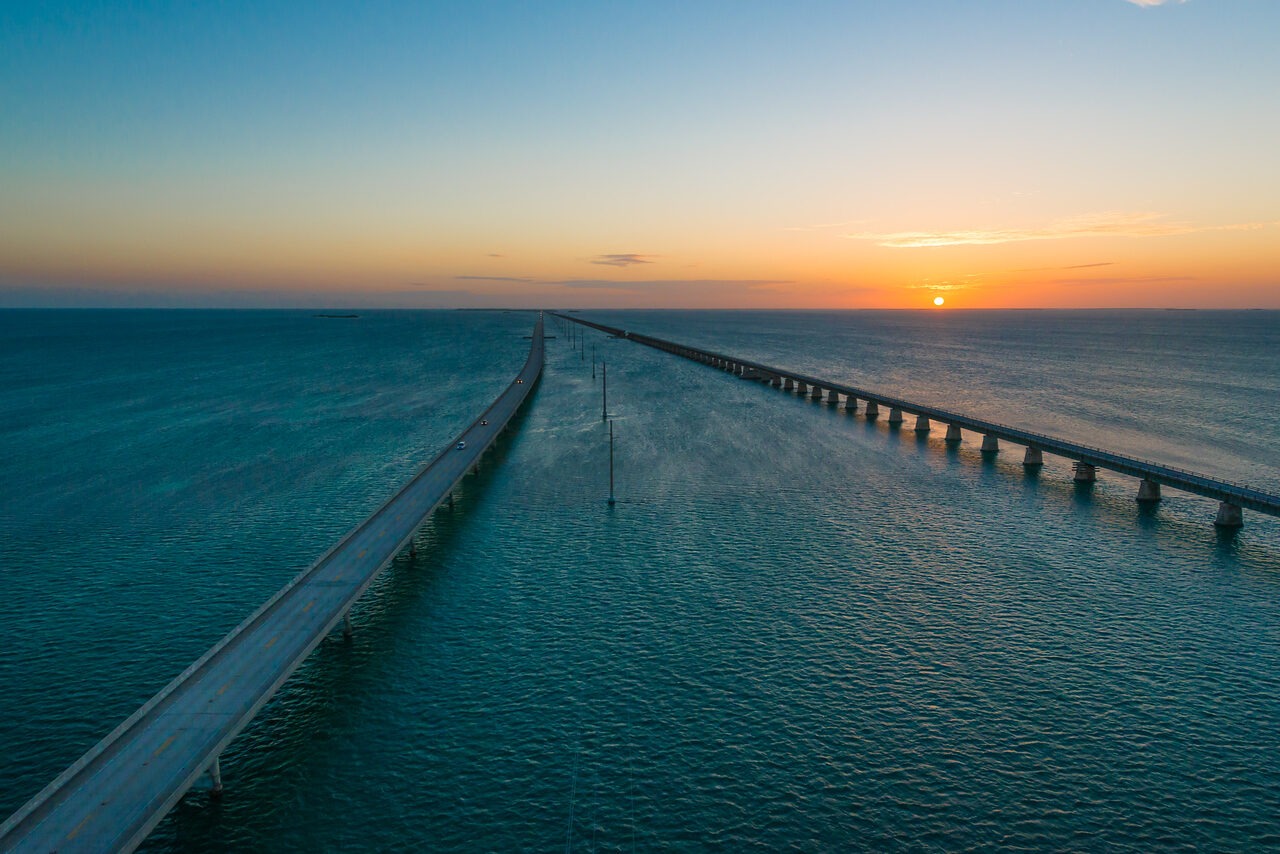 Aerial view of the Seven Mile Bridge in the Florida Keys at sunset, photographed by Edin Chavez