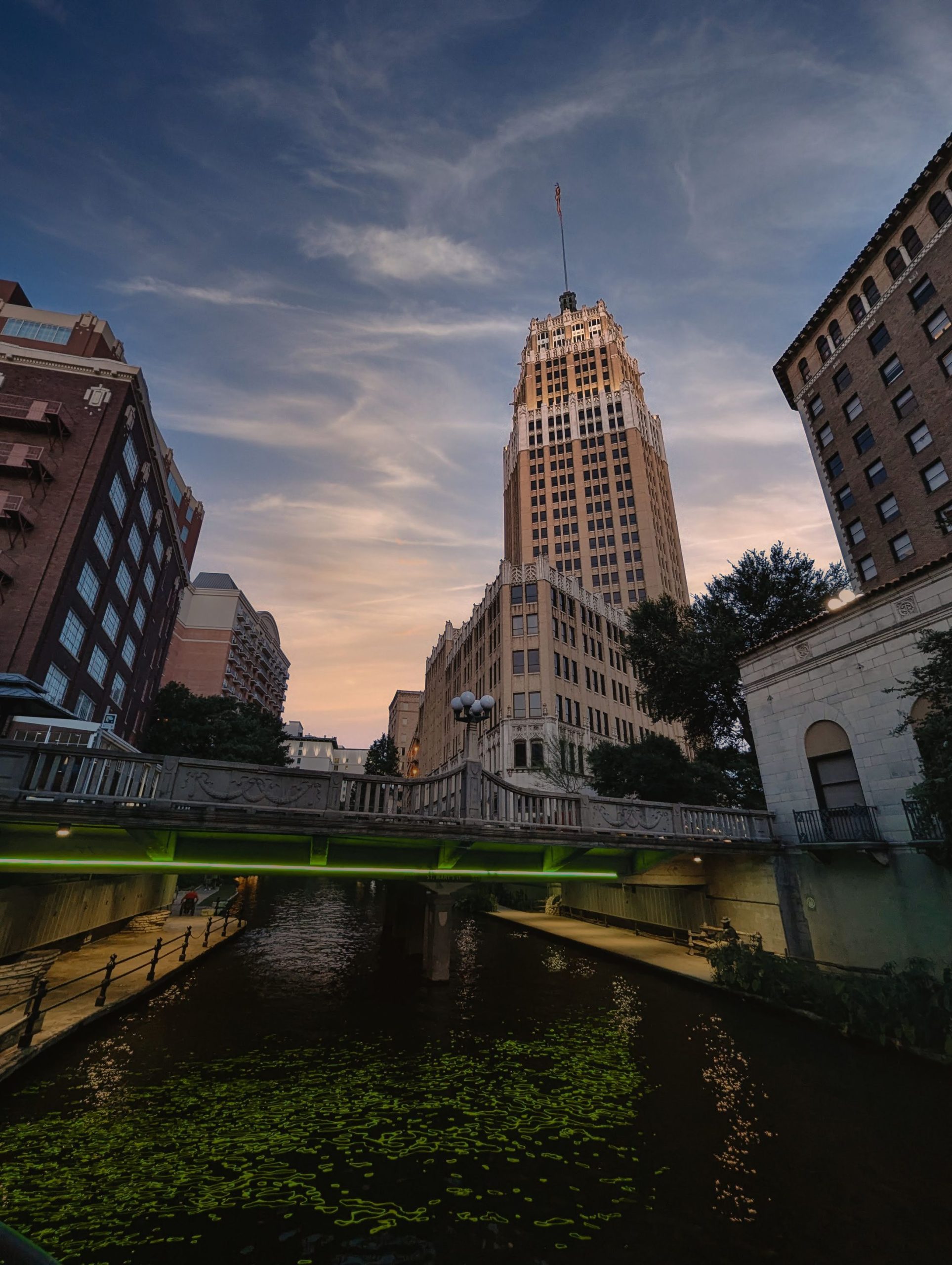 Tower Life Building and San Antonio River Walk at sunset