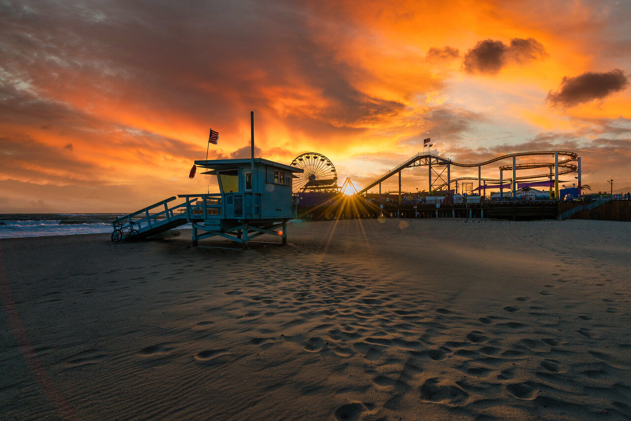 Santa Monica Pier Ferris wheel at fiery sunset