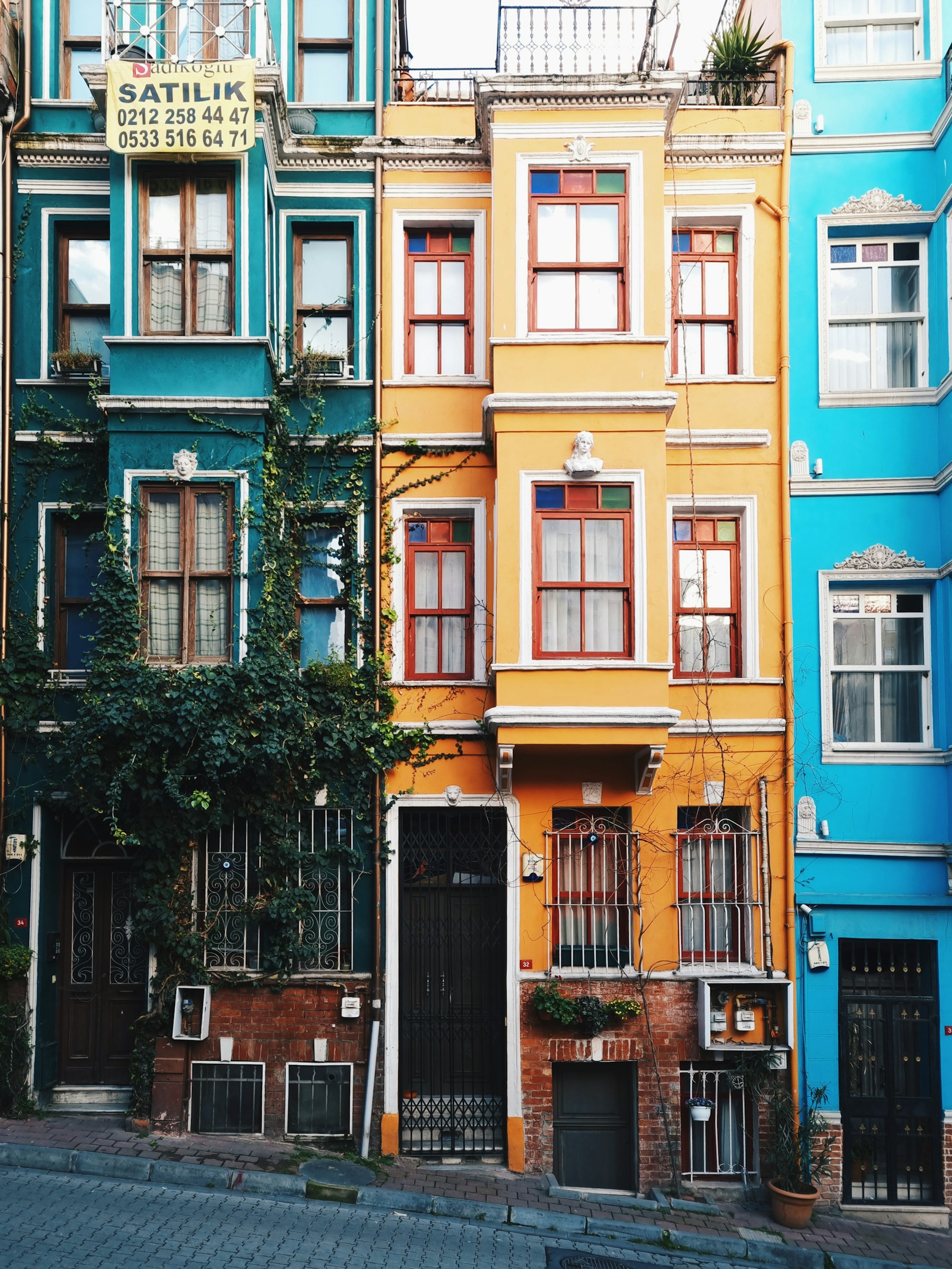 Colorful Balat facades with ornate windows