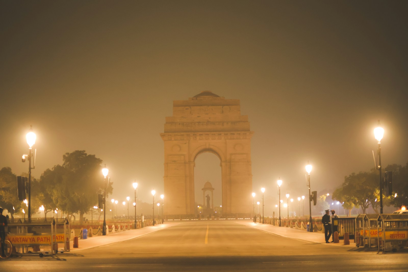 India Gate and Kartavya Path lamps in fog at night
