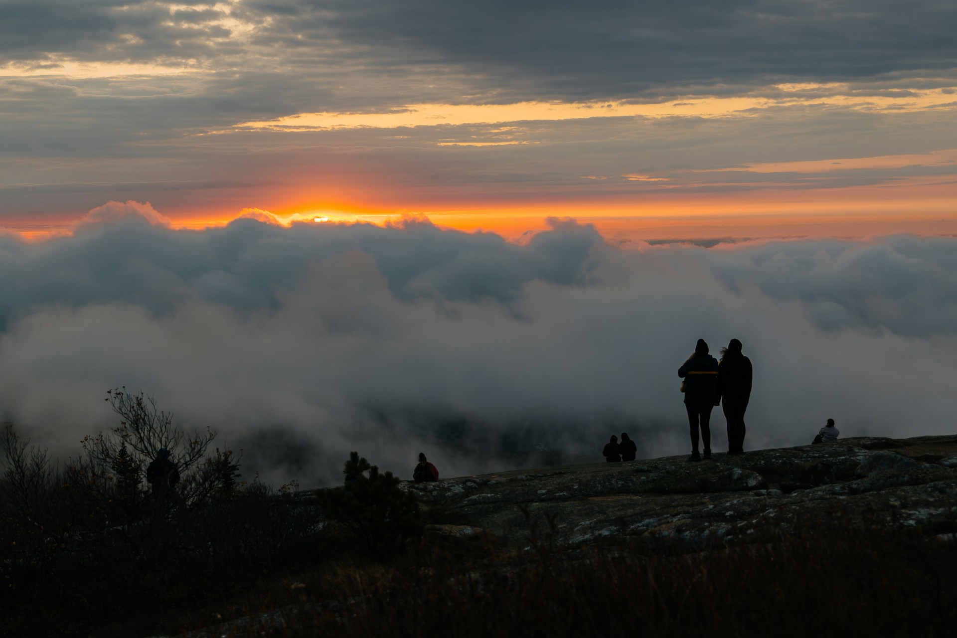 Sunrise above a sea of clouds from Cadillac Mountain