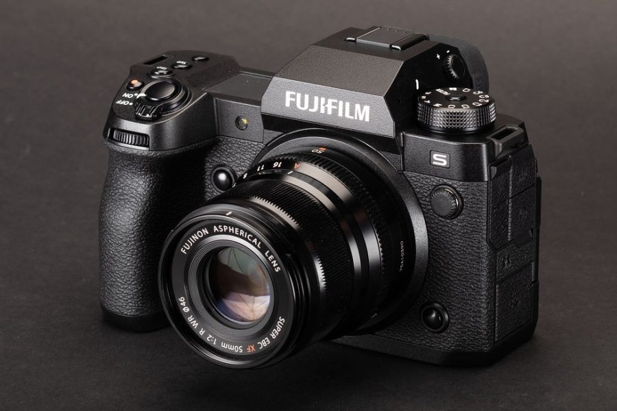 Fujifilm X-H2S camera with lens photographed from a front three-quarter angle