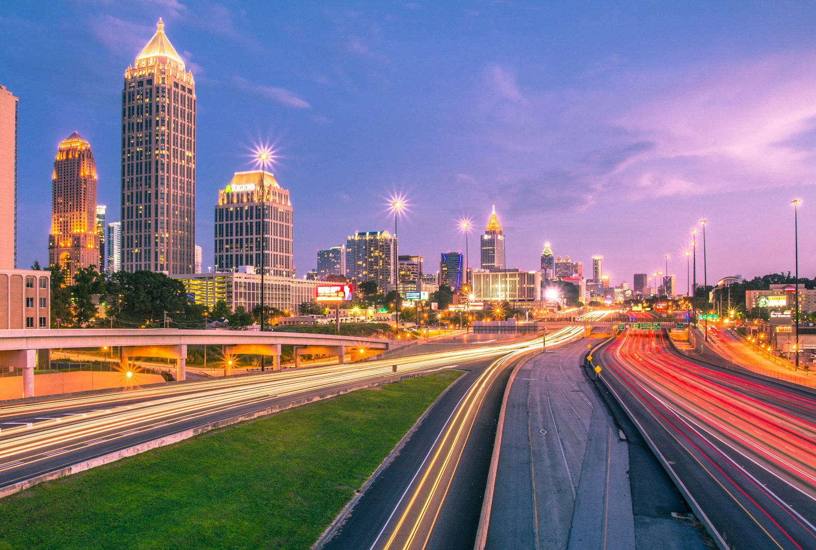 Atlanta skyline and highway light trails at twilight