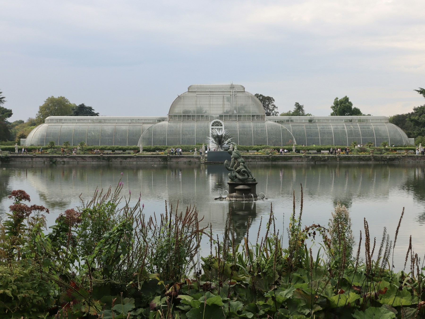The Palm House at Kew Gardens seen across the pond