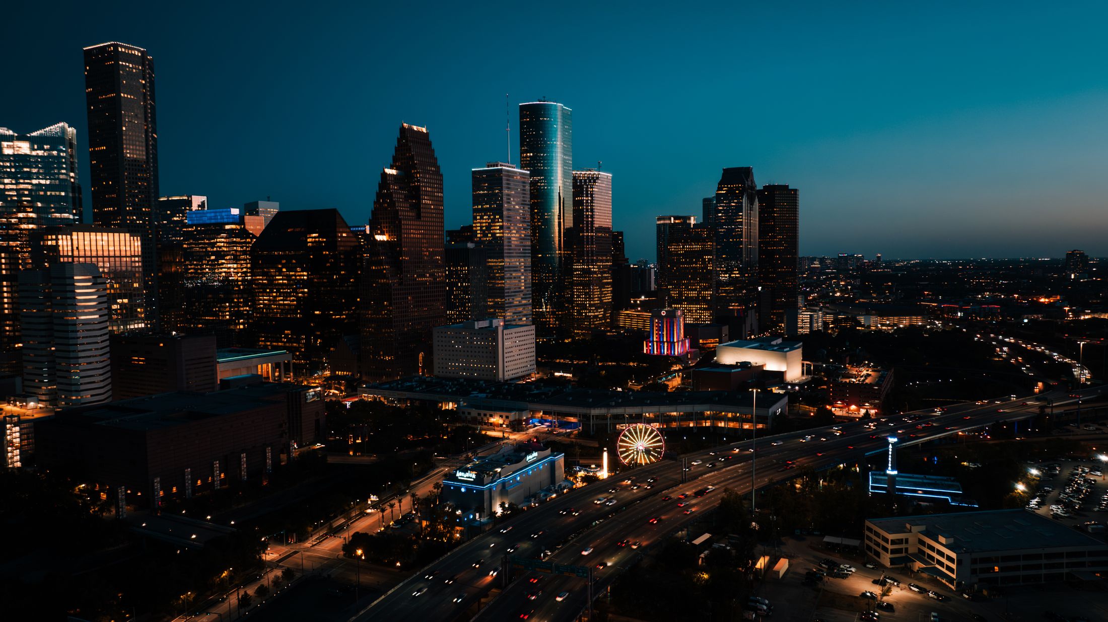 Downtown Houston skyline illuminated at blue hour