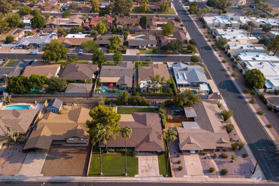 Aerial view of houses, yards and streets in a suburban neighborhood